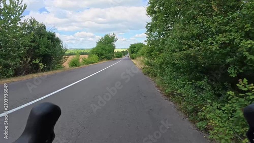 Gravel bicycle ride on the road in the summer season