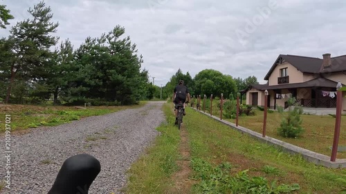 Gravel bicycle ride on the road in the summer season