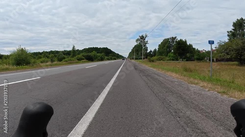 Gravel bicycle ride on the road in the summer season