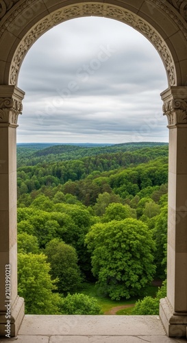 Archway View of Lush Green Forest and Rolling Hills.