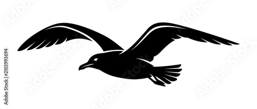 Schilderij op canvas Silhouette of a seabird in flight