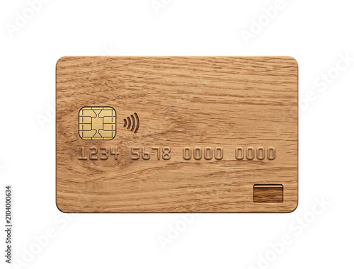 Wooden credit card with contactless payment chip isolated on transparent grid background view.