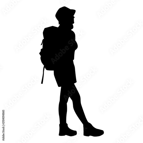 Vector silhouette of a young female backpacker standing while holding her backpack.