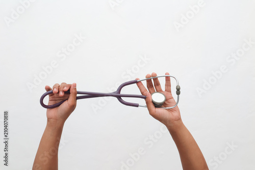 Hands Holding Stethoscope Medical Healthcare Concept