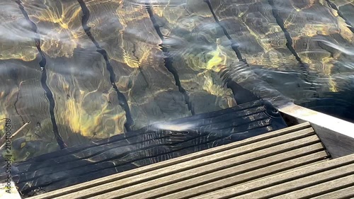 Pier in harbour under water