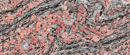 Canvastavla Rose granite surface featuring dense natural crystal patterns with contrasting g