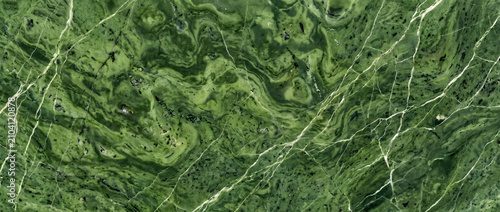 Foto Marble texture displaying a stunning polished green jade mineral surface with in