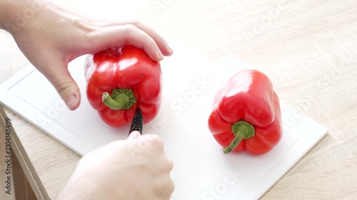Preparing Red Bell Pepper by Removing Seeds and Inner Parts in a Home Kitchen, 4K