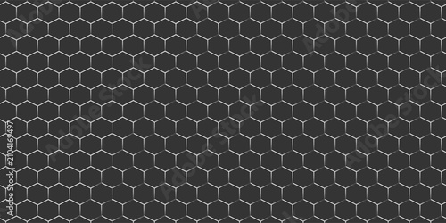 Grey hexagonal mesh texture background with metallic honeycomb pattern. Abstract industrial steel grate surface for tech wallpaper, automotive design, and modern corporate backdrop. Seamless metal net
