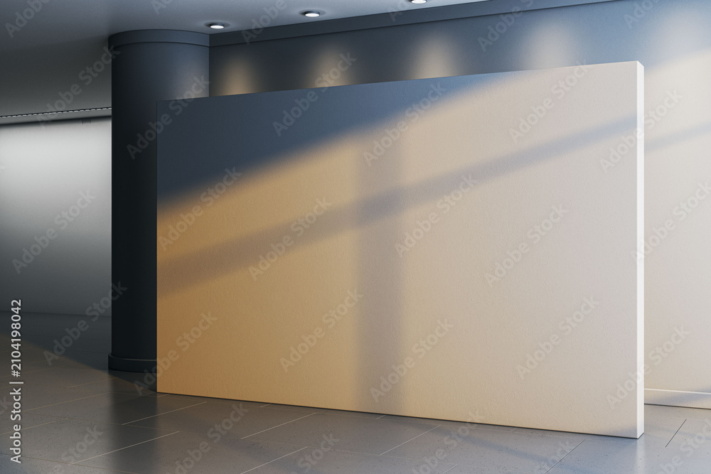 Obraz premium Big blank white wall board mockup standing in dark hall interior with gray column spotlights and tiled floor for exhibition poster placement. 3D Rendering