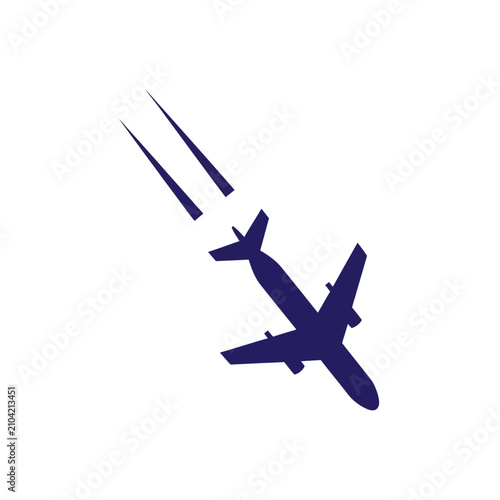 dark blue silhouette of a modern airplane in descent leaving a trail