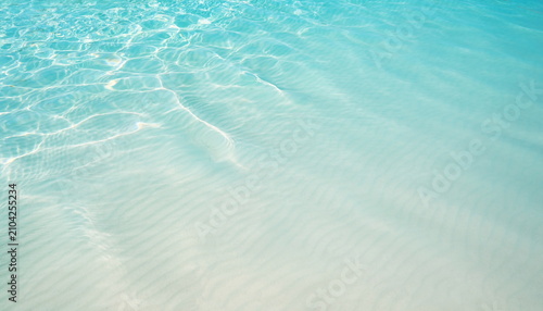 Tropical turquoise sea waves washing over white sand beach 白い砂浜に打ち寄せるターコイズブルーの熱帯の波