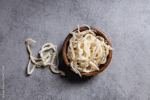 Wooden Bowl With Shredded Squid Strips