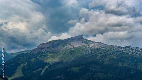 Bild auf Leinwand the summit called Hoher Ifen in the little valley of Walser, Austria on a cloudy summer day