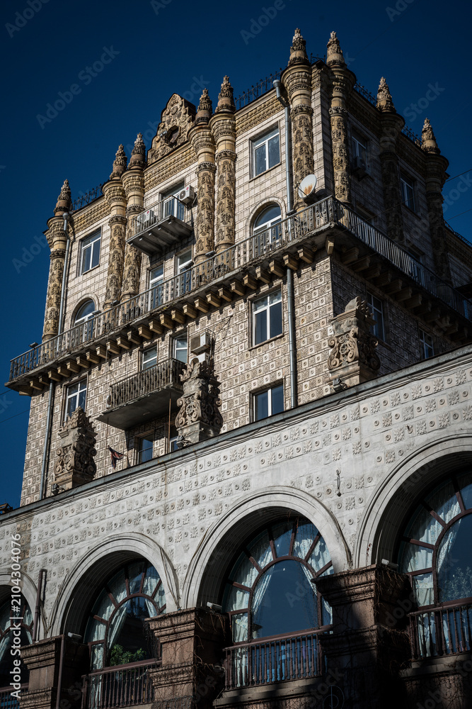 Fototapeta premium Gorodetsky House Detailed Facade with Decorative Elements and Arched Windows