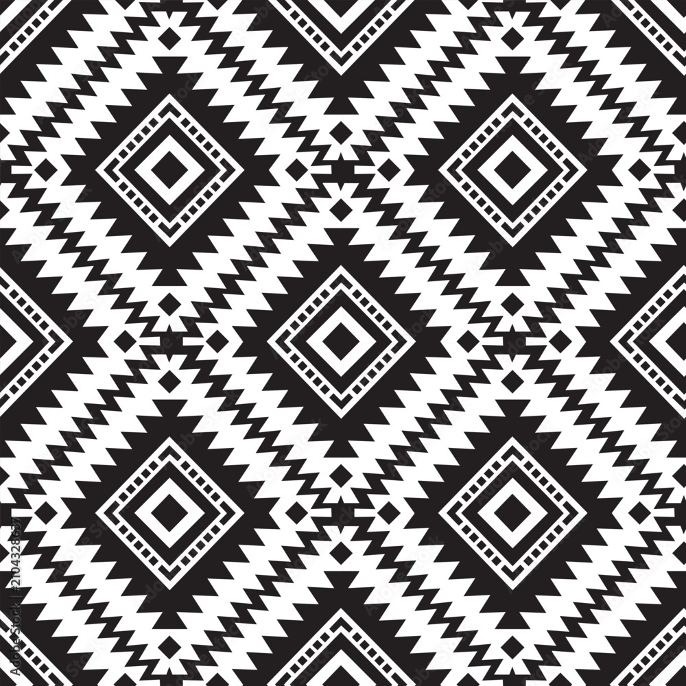 Fototapeta premium Intricate black and white Aztec tribal seamless pattern vector illustration. Modern flat southwestern ethnic geometric diamond navajo repeat background with zigzag chevron motifs.