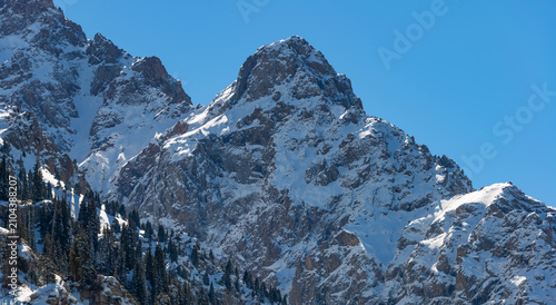 Canvas Print The picturesque Oktyabrenok Peak in the Trans-Ili Alatau mountains near the Kazakh city of Almaty
