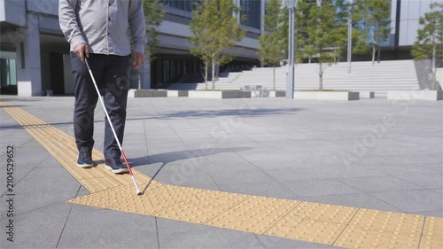 Tactile Paving and Cane in Accessible Public Plaza