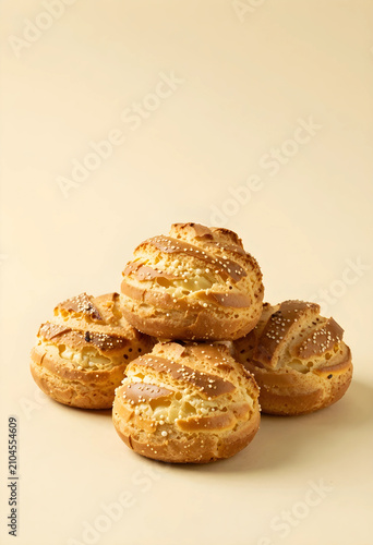 Four choux cream desserts o...