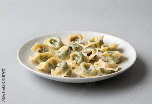 Cooked tortellini on a whit...