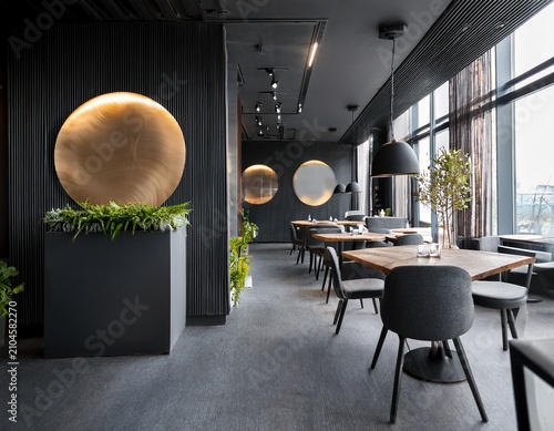 modern interior of a restaurant with dark gray walls