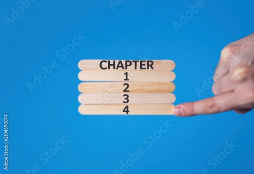 Wooden craft sticks with chapter 1 2 3 4 text