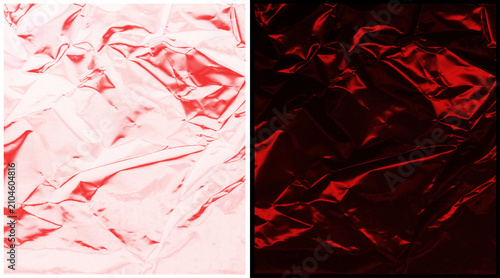 Metallic red foil texture background, crumpled shiny plastic wrap surface, abstract creased foil paper with light and dark contrast for luxury packaging