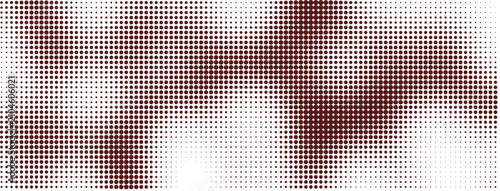 Abstract halftone pattern with dark red circular dots