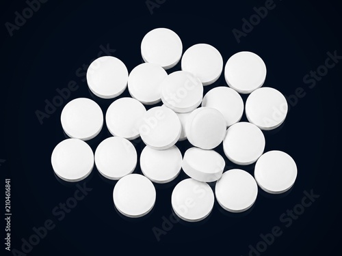 фотографія Round White Pharmaceutical Tablets Isolated on Black Background, Close Up Medici