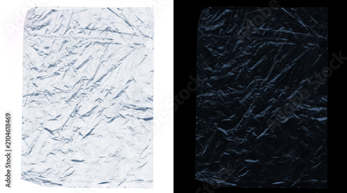 Tableau sur toile Crumpled plastic wrap texture on white and black background, wrinkled transparen