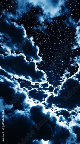 Deep Blue Night Sky With Stars and Clouds Underneath