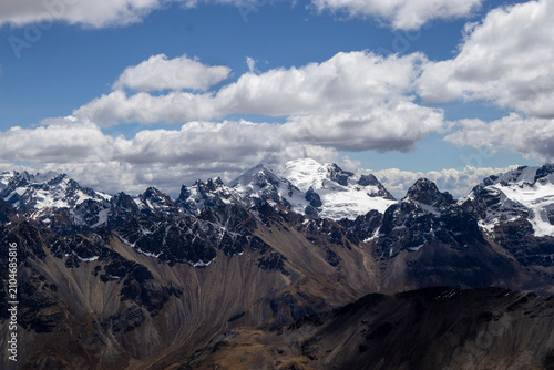 Photography Majestic snow capped mountain peaks in the Andes range