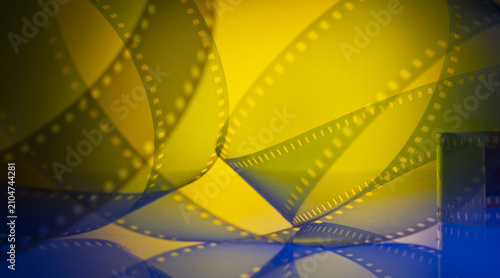 Konstfotografi colorful modern abstract cinema background with filmstrip for announcements post