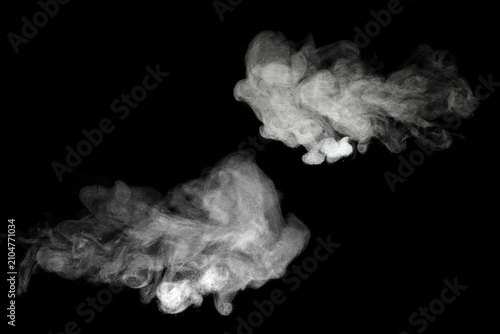 white smoke steam spray, and abstract vapor water isolated on a black background. concept of texture cold mist or hot vapor