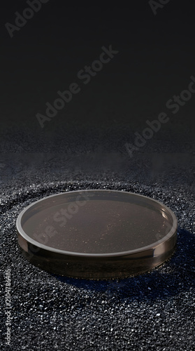 Minimalist black sand podium with circular glass platform for product display