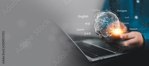 Canvastavla Global language translation and multilingual communication concept with digital world map on a laptop, featuring AI translation, language localization, international cross-cultural communication
