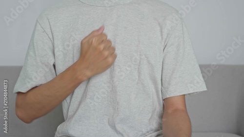 Asian man learning to using sign language