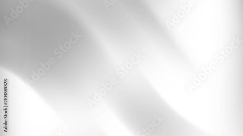 Abstract white flowing waves moving smoothly across the frame