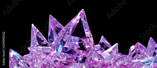 Captivating Abstract Violet Crystal Formation with Sharp Geometric Facets Against a Black Background