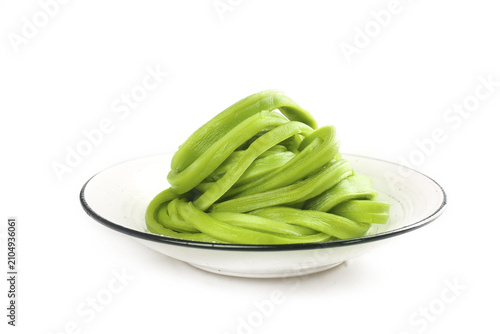 Bild auf Leinwand Fresh Green Spinach Pasta Noodles Twisted on White Plate Studio Food Photography