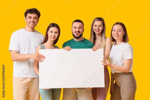 Group of five smiling young...