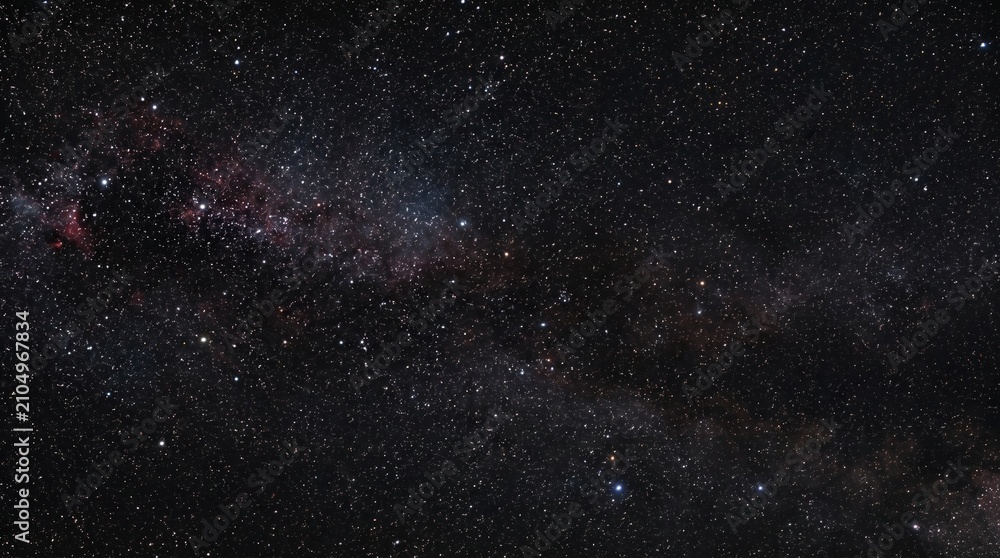 Fototapeta premium Dark deep space background filled with millions of tiny shining stars and subtle galaxy dust.