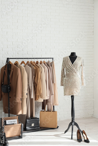 Mannequin and rack with clo...
