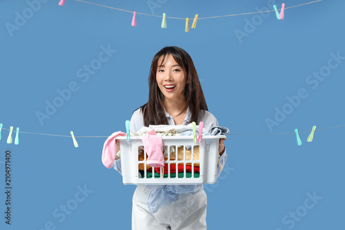 Happy young Asian woman wit...