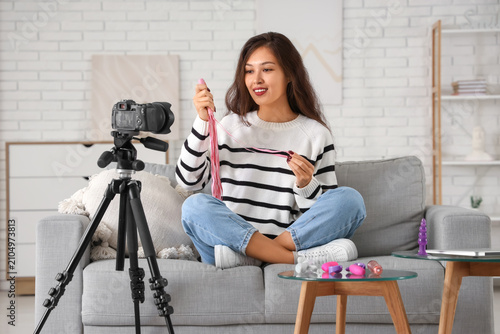 Female Asian blogger with w...