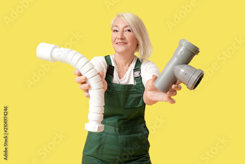 Mature female plumber with ...