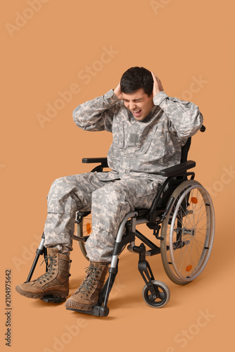 Young soldier in wheelchair...
