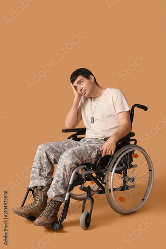 Young soldier in wheelchair...