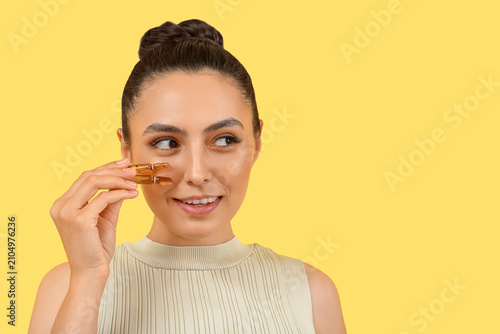Beautiful young woman with ...