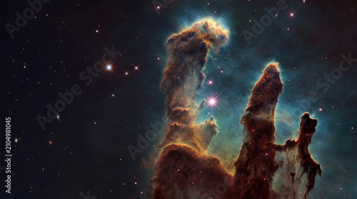 Carina nebula star forming pillars of gas and dust with dark copy space for text, deep space background